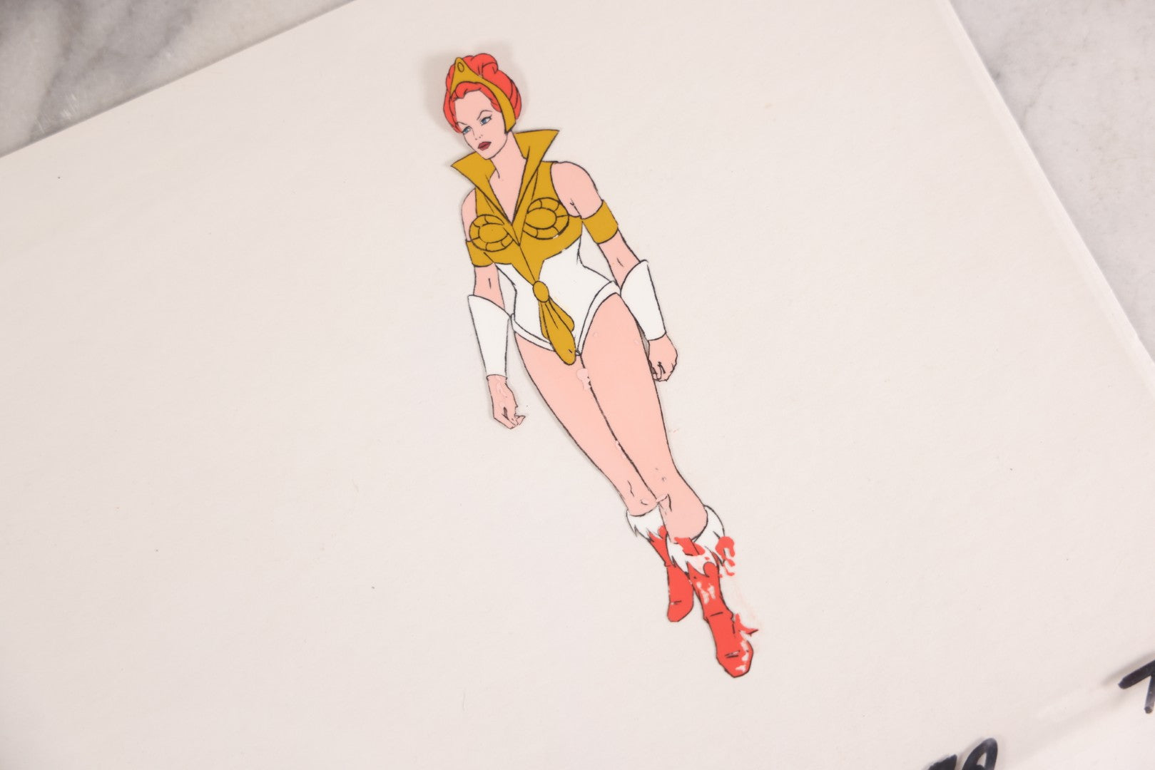 Lot 079 - Grouping Of Five Original Reverse-Painted Production Character Animation Cels On Celluloid From 1983 Cartoon "He-Man And The Masters Of The Universe," He-Man (2), Orko (2), And Teela (1)