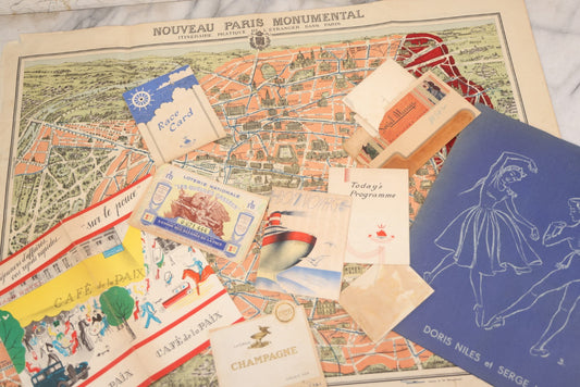 Lot 080 - Vintage European Tourism Ephemera Lot, Including 1938 French Dance Program, Double-Sided Fold Out Map Of Paris And Environs, Assorted Ephemera From 1939 Queen Mary Trip To England, And Paper Menu From "Cafe De La Paix"
