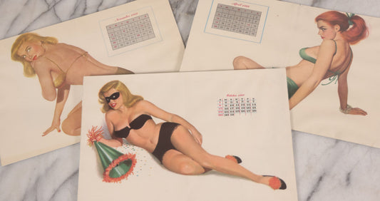 Lot 087 - Grouping Of Three Vintage Pin-Up Calendar Pages Including April 1949, November 1949, And October 1950, Illustrated With Risqué Women
