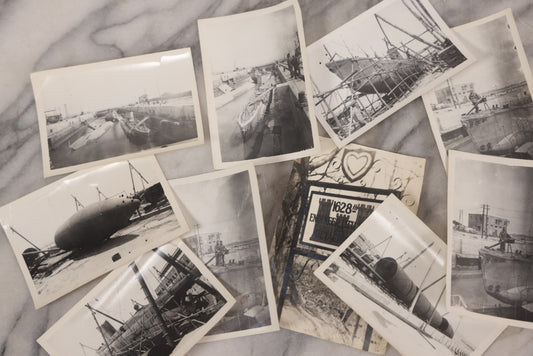 Lot 104 - Grouping Of Ten Vintage Snapshot Photographs Of Men In Military Uniforms Working On And Around A Navy Submarine, Circa 1940s World War II Era