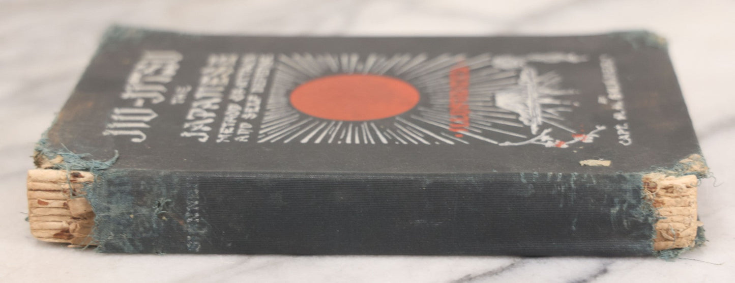 Lot 106 - "Jiu-Jitsu And Japanese Method Of Attack And Self Defense" Antique Illustrated Martial Arts Instruction Book By Captain H.H. Skinner, With Many Photograph Plates Demonstrating Positions, Note Poor Condition