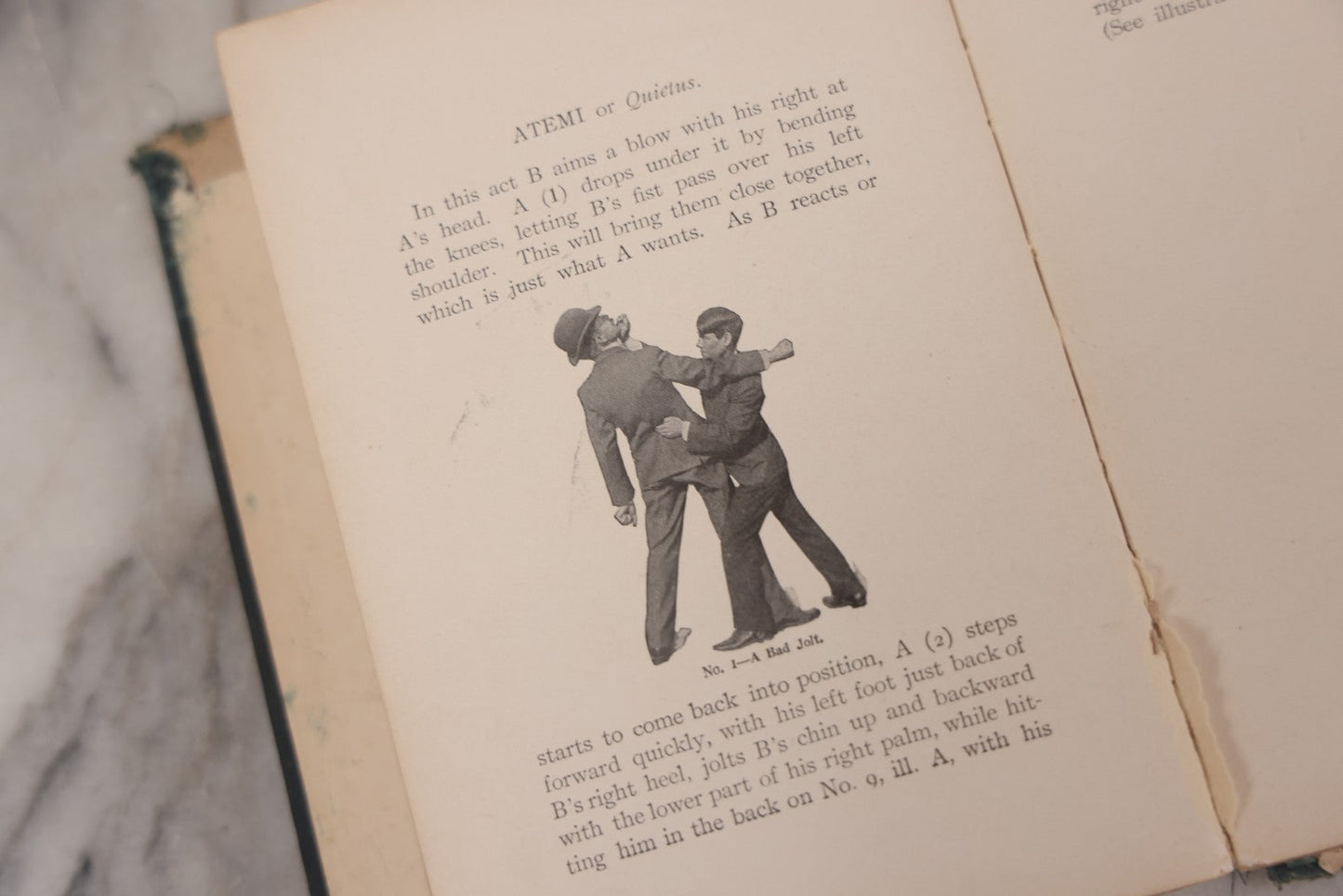 Lot 106 - "Jiu-Jitsu And Japanese Method Of Attack And Self Defense" Antique Illustrated Martial Arts Instruction Book By Captain H.H. Skinner, With Many Photograph Plates Demonstrating Positions, Note Poor Condition