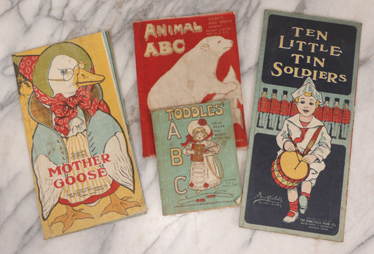 Lot 137 - Grouping Of Four Antique Linen Rag Books Including "Animal A.B.C." And "Toddle's A.B.C.," Published By Dean's Rag Book Co. Ltd., London, And "Ten Little Tin Soldiers"  And "Mother Goose," Published By The Saalfield Pub. Co., New York, 1910