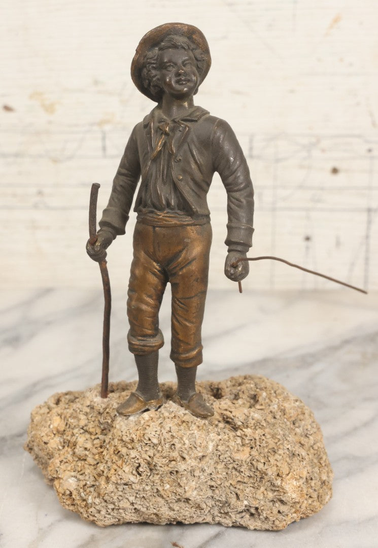Lot 005 - Antique Bronze Figural Sculpture Of Young Fishing Boy With Walking Stick, Mounted On Natural Stone Base, Circa Late 19th Century, 8-1/2" H