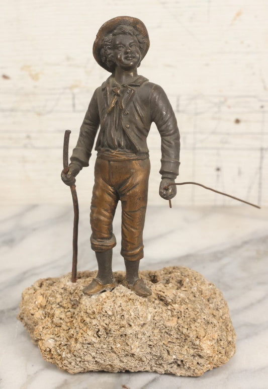 Lot 005 - Antique Bronze Figural Sculpture Of Young Fishing Boy With Walking Stick, Mounted On Natural Stone Base, Circa Late 19th Century, 8-1/2" H