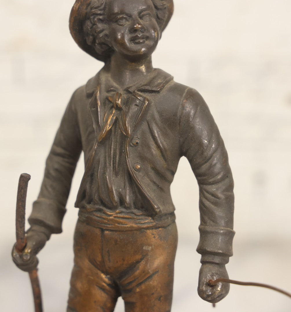 Lot 005 - Antique Bronze Figural Sculpture Of Young Fishing Boy With Walking Stick, Mounted On Natural Stone Base, Circa Late 19th Century, 8-1/2" H