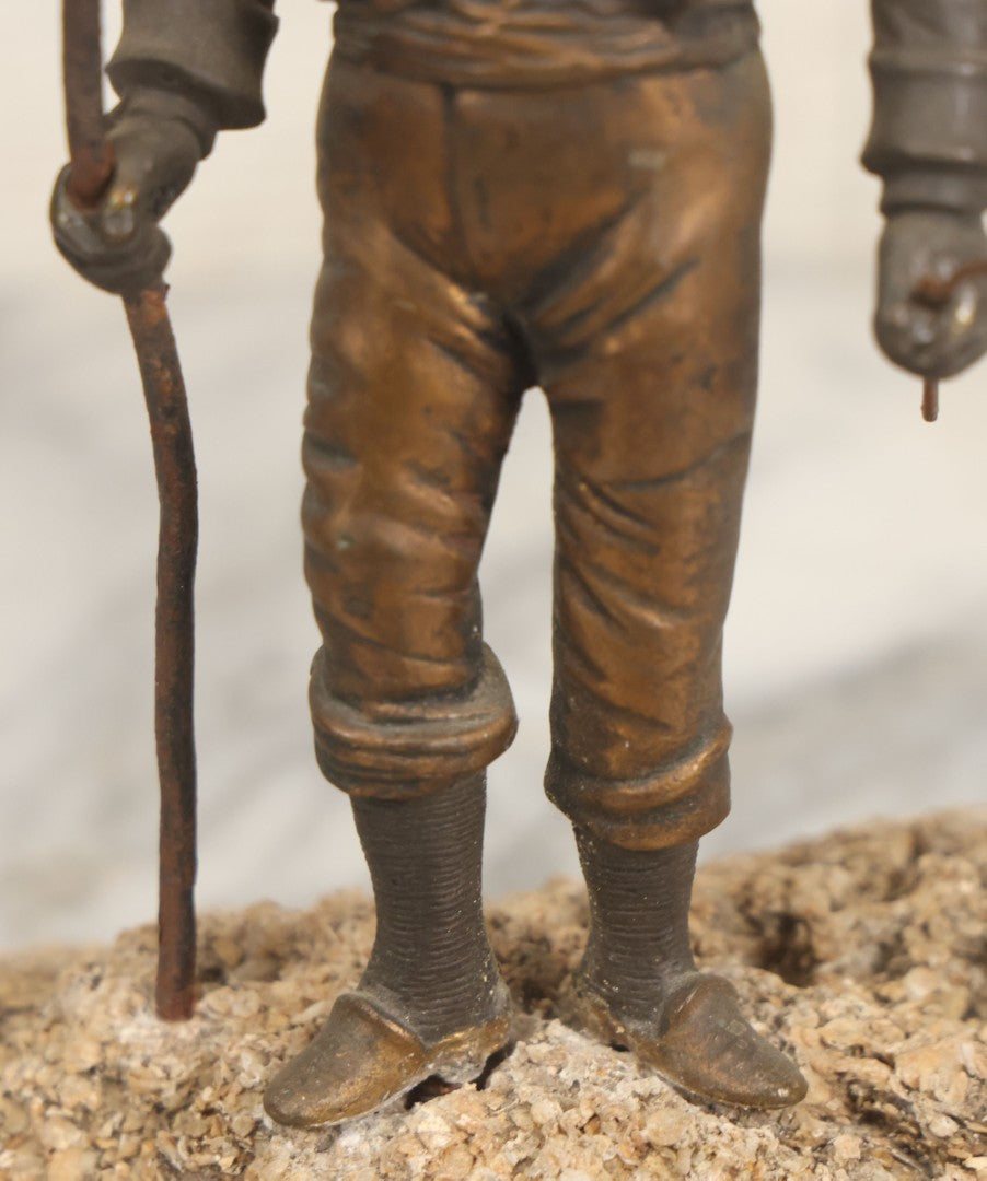 Lot 005 - Antique Bronze Figural Sculpture Of Young Fishing Boy With Walking Stick, Mounted On Natural Stone Base, Circa Late 19th Century, 8-1/2" H