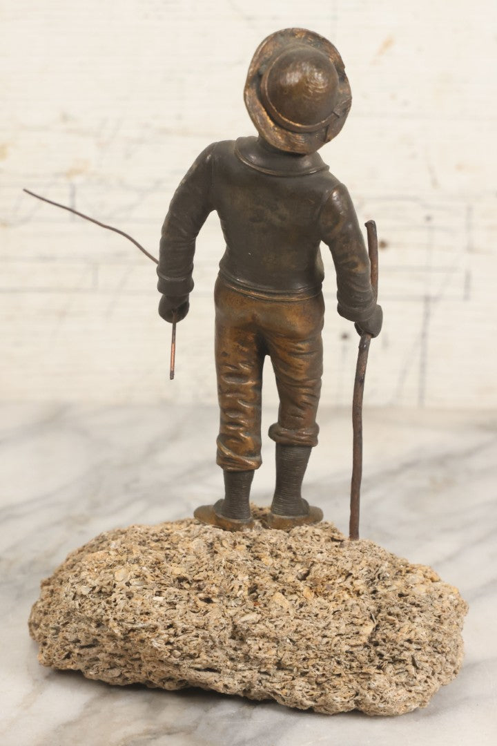 Lot 005 - Antique Bronze Figural Sculpture Of Young Fishing Boy With Walking Stick, Mounted On Natural Stone Base, Circa Late 19th Century, 8-1/2" H