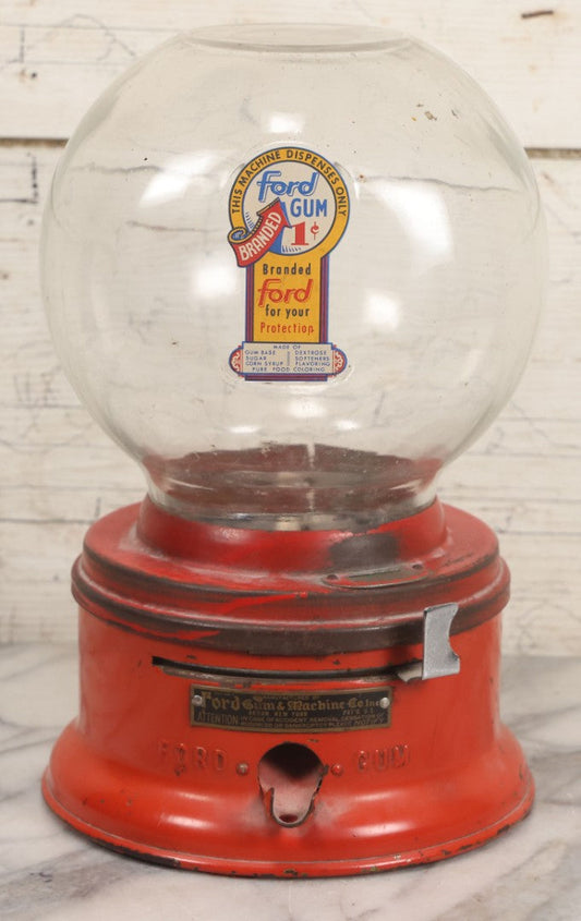 Lot 010 - Vintage Ford 1¢ Gum Machine With Glass Globe And Red Painted Base, Manufactured By Ford Gum & Machine Co. Inc., Akron, New York, 11" H