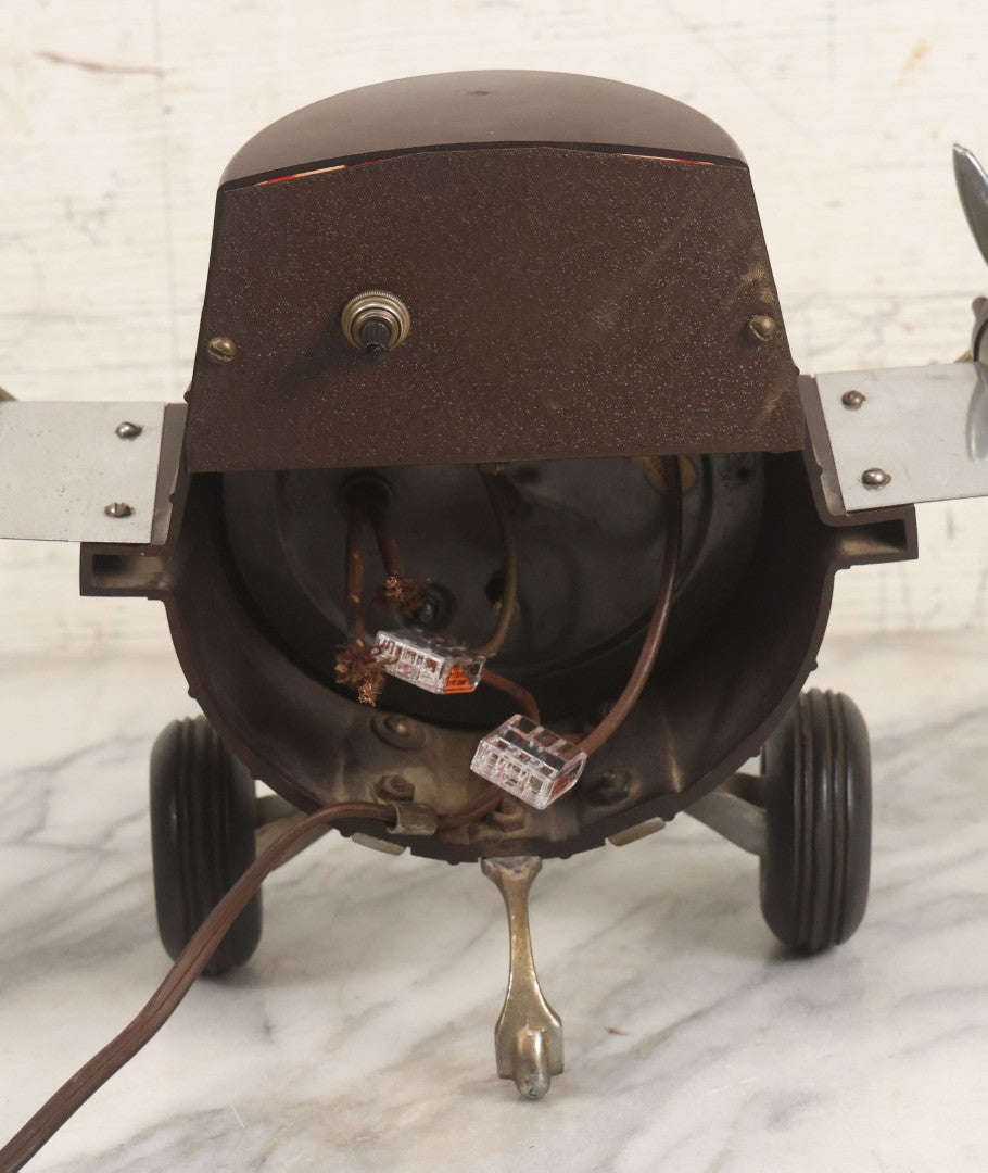 Lot 011 - Vintage Bakelite Airplane Form Clock With Internal Lamp, Note Clock Does Not Work And Both Propellers Missing One Blade