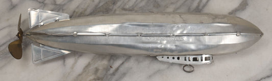Lot 014 - Vintage Graf Zeppelin Tin Wind Up Toy By Ferdinand Strauss, Inc., New York City, Marked Patent Pending With Tail No. G.Z.2017, Note Dented, Split In Tin, 16-1/2" L