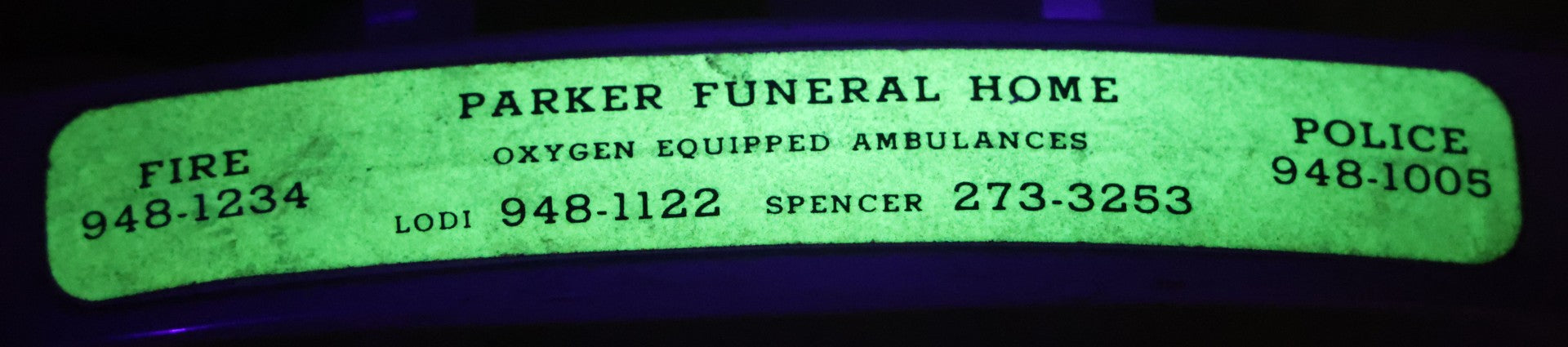 Lot 015 - Vintage Pink Rotary Telephone With Parker Funeral Home Label Advertising Oxygen Equipped Ambulances, Glow In The Dark Label With Numbers For Lodi, Spencer, Police And Fire, Untested