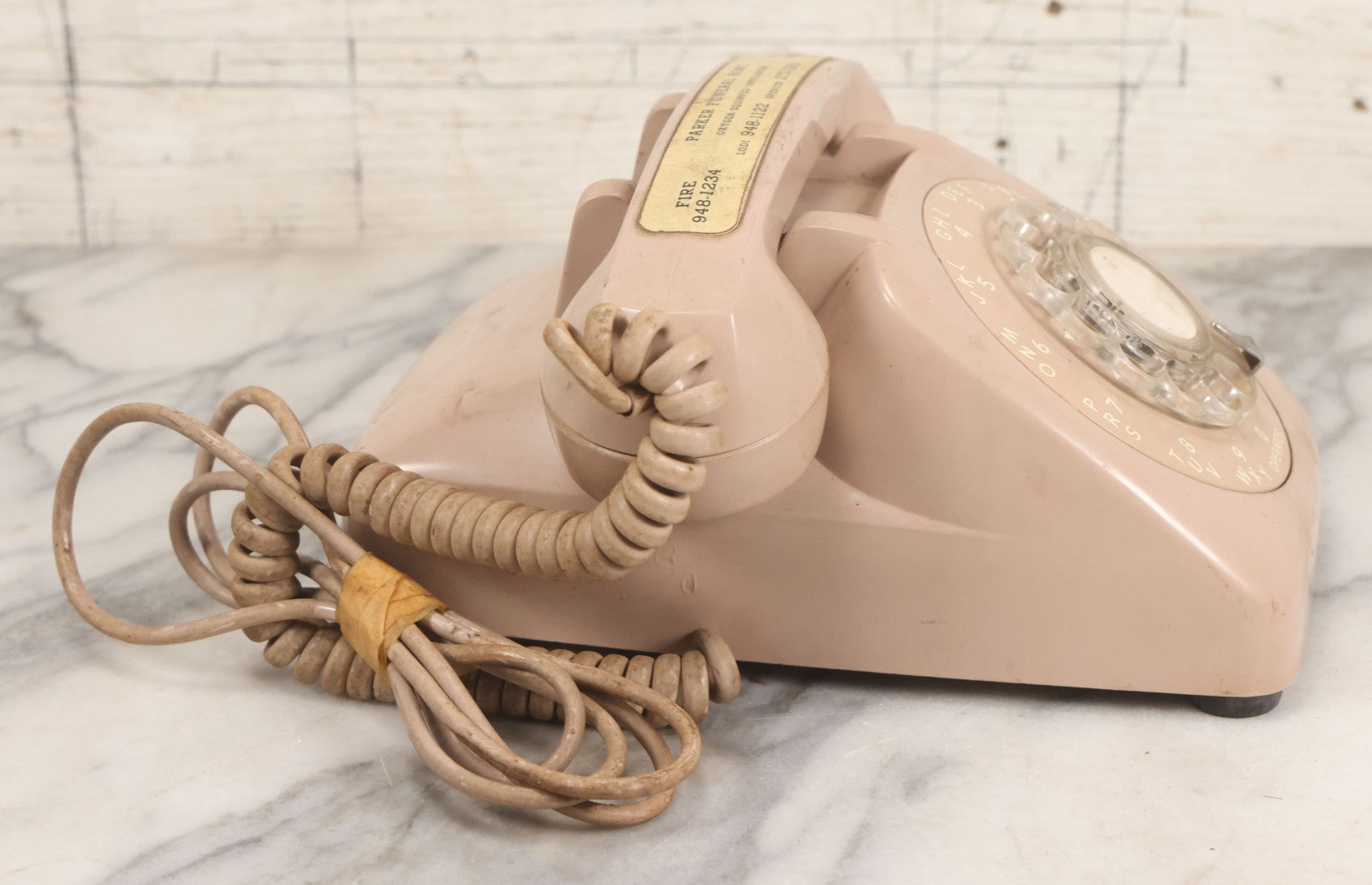 Lot 015 - Vintage Pink Rotary Telephone With Parker Funeral Home Label Advertising Oxygen Equipped Ambulances, Glow In The Dark Label With Numbers For Lodi, Spencer, Police And Fire, Untested
