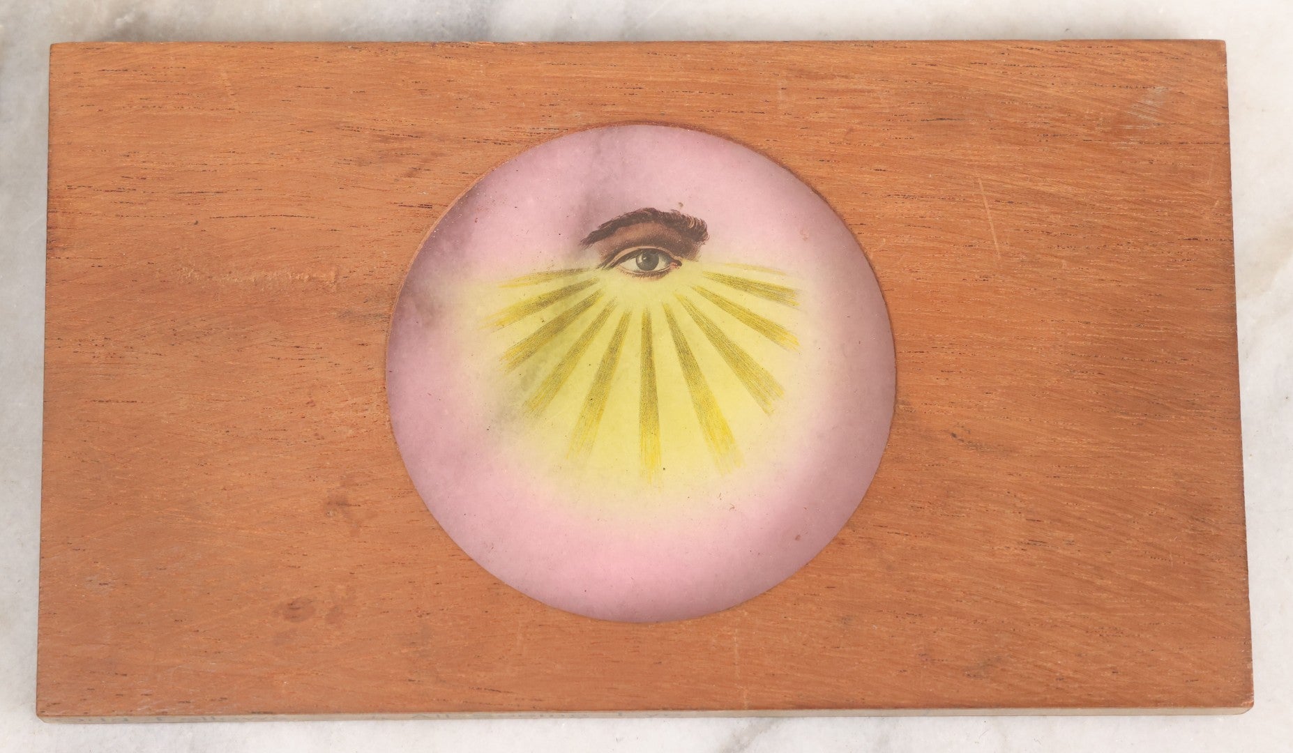 Lot 017 - Antique Hand Colored Odd Fellows I.O.O.F. Magic Lantern Glass Slide With Wood Holder, No. 1 All-Seeing Eye, Manufactured By The Henderson-Ames Co., Kalamazoo, Michigan