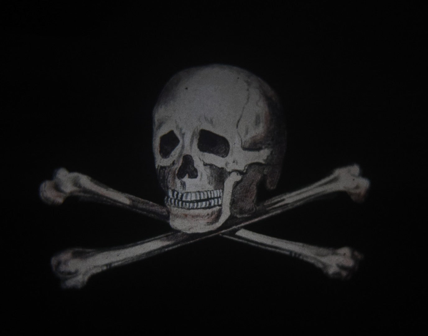 Lot 019 - Antique Hand Colored Odd Fellows I.O.O.F. Magic Lantern Glass Slide With Wood Holder, No. 3 Skull And Cross-Bones, Manufactured By The Henderson-Ames Co., Kalamazoo, Michigan