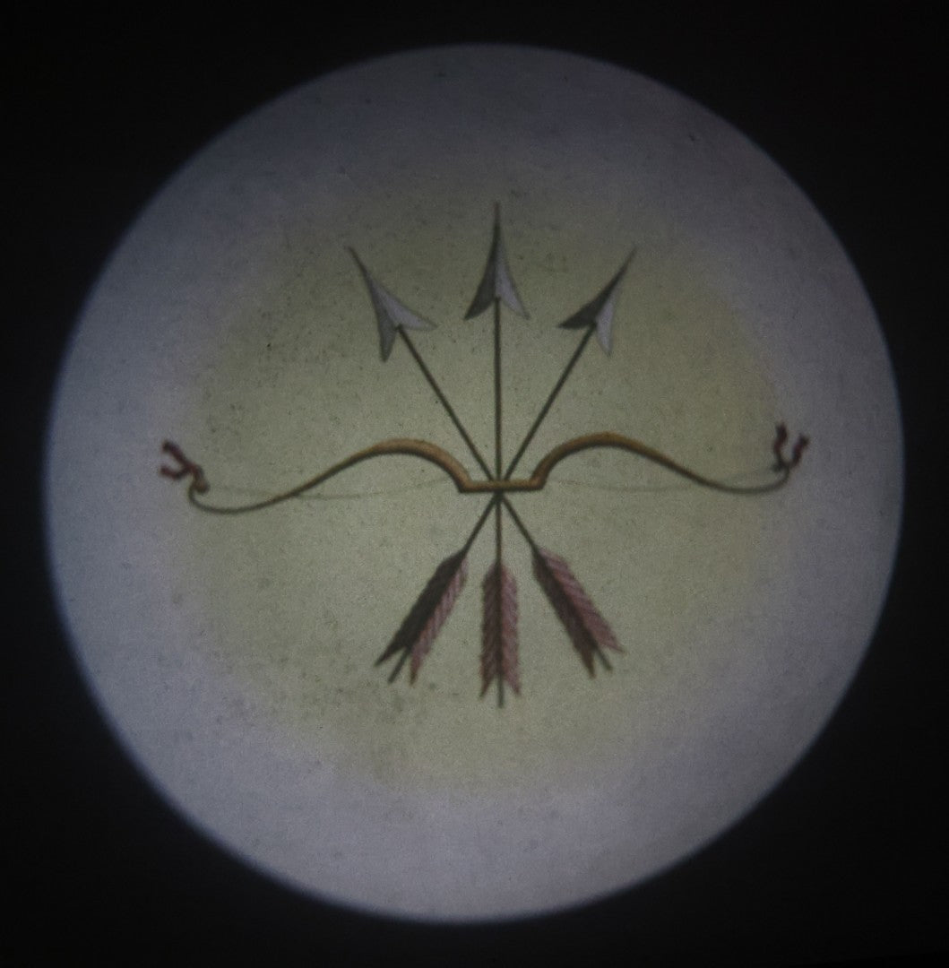 Lot 021 - Antique Hand Colored Odd Fellows I.O.O.F. Magic Lantern Glass Slide With Wood Holder, No. 5 Bow And Arrow, Manufactured By The Henderson-Ames Co., Kalamazoo, Michigan