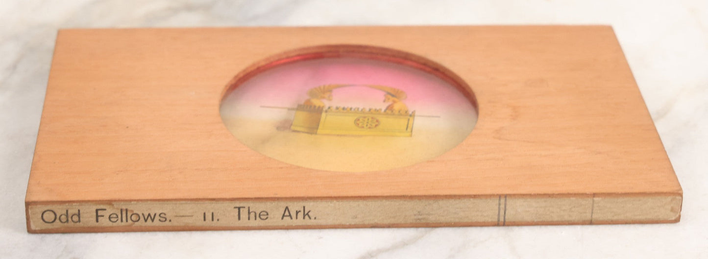 Lot 027 - Antique Hand Colored Odd Fellows I.O.O.F. Magic Lantern Glass Slide With Wood Holder, No. 11 The Ark, Manufactured By The Henderson-Ames Co., Kalamazoo, Michigan