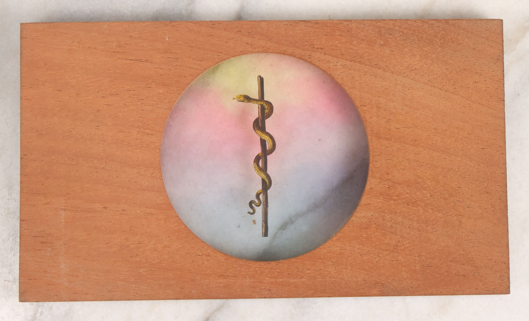 Lot 028 - Antique Hand Colored Odd Fellows I.O.O.F. Magic Lantern Glass Slide With Wood Holder, No. 12 The Serpent, Manufactured By The Henderson-Ames Co., Kalamazoo, Michigan