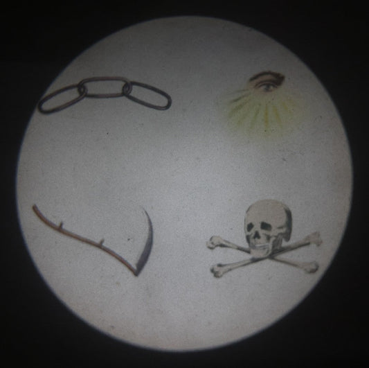 Lot 033 - Antique Hand Colored Odd Fellows I.O.O.F. Magic Lantern Glass Slide With Wood Holder, Initiatory Degree, Depicting The Three Links, Scythe, Skull And Cross-Bones, And All-Seeing Eye, Manufactured By The Henderson-Ames Co., Kalamazoo, Michigan