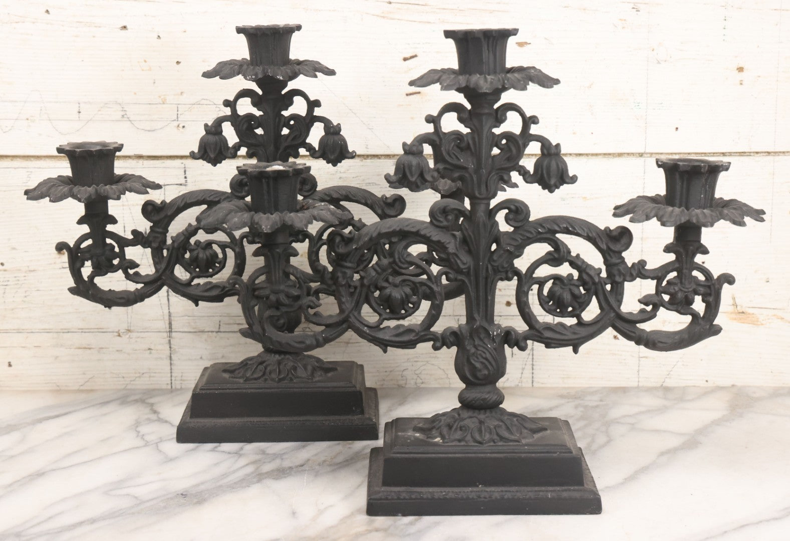 Lot 041 - Vintage Pair Of Ornate Cast Aluminum Three-Arm Candelabra With Scrolling Foliate Design And Square Plinth Bases, Painted Black, Reproductions Of Earlier Designs, 13-1/2" H Each