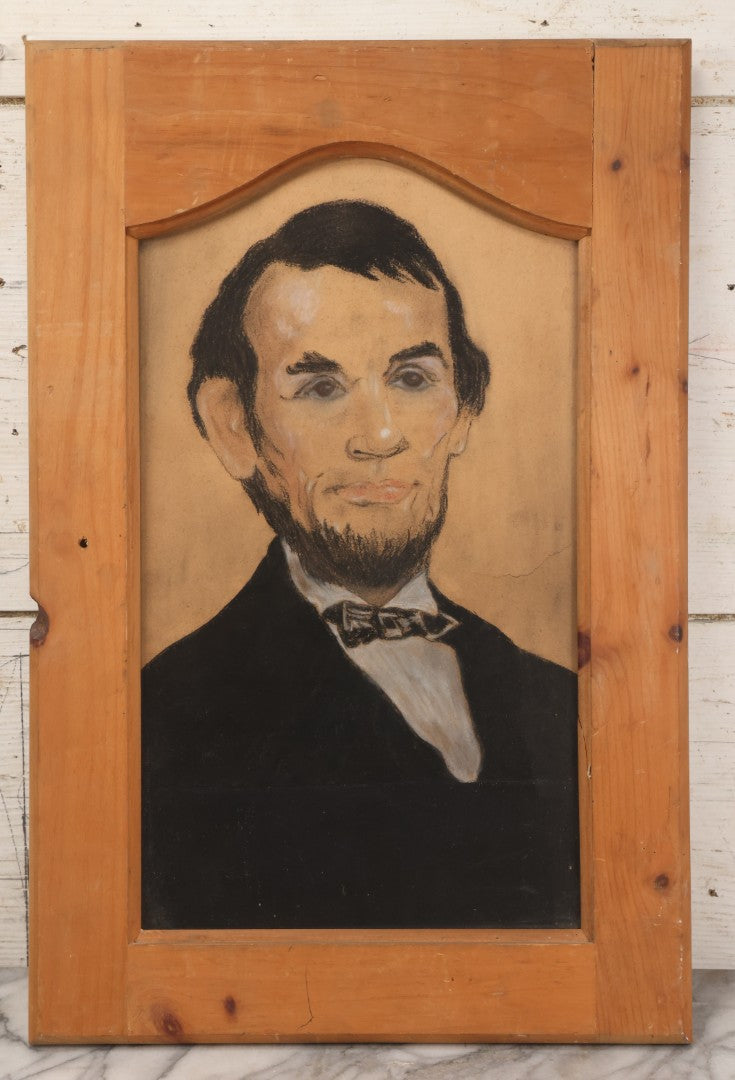 Lot 050 - Vintage Folk Art Pastel Portrait Of Abraham Lincoln, Presented In Repurposed Cabinet Door Frame, 14-3/8" x 21-5/8"