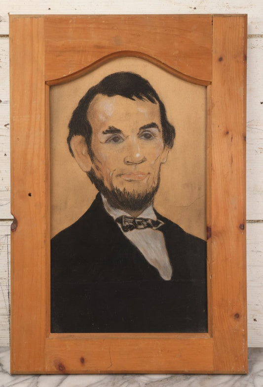 Lot 050 - Vintage Folk Art Pastel Portrait Of Abraham Lincoln, Presented In Repurposed Cabinet Door Frame, 14-3/8" x 21-5/8"