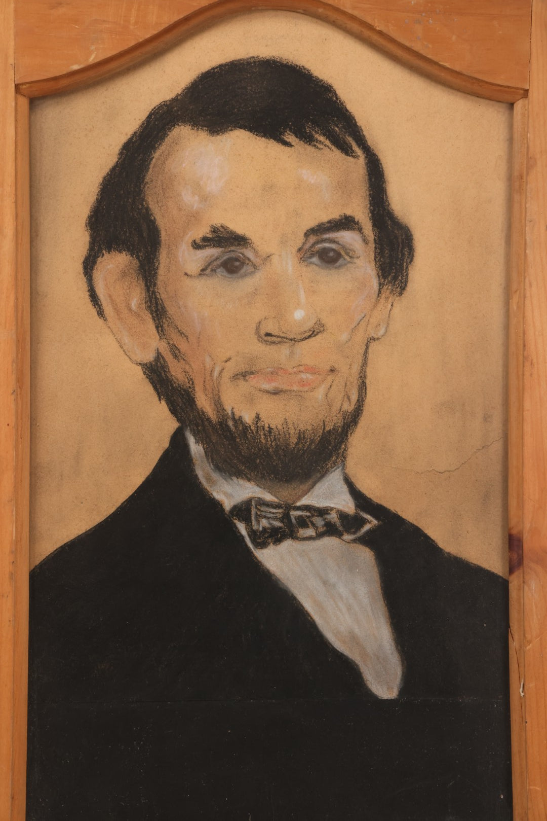 Lot 050 - Vintage Folk Art Pastel Portrait Of Abraham Lincoln, Presented In Repurposed Cabinet Door Frame, 14-3/8" x 21-5/8"