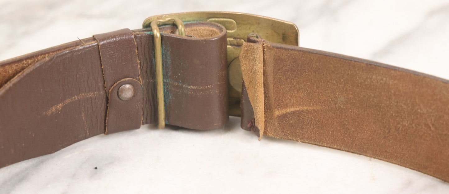 Lot 060 - Trio Of Antique Leather Belts Including Brass Anchor Buckle, Brass Eagle-And-Anchor Buckle, And Belt Marked “Sgt. Standish, Co. L. 182nd Inf.”