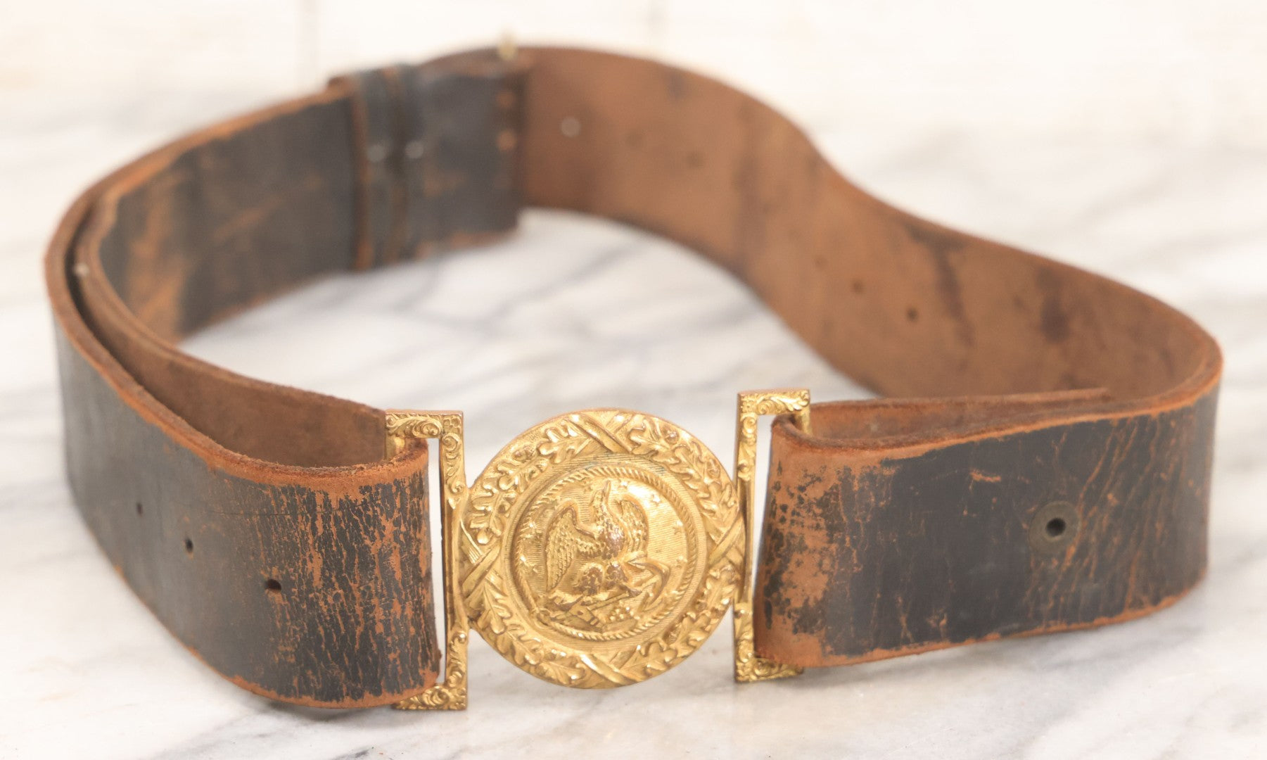 Lot 060 - Trio Of Antique Leather Belts Including Brass Anchor Buckle, Brass Eagle-And-Anchor Buckle, And Belt Marked “Sgt. Standish, Co. L. 182nd Inf.”
