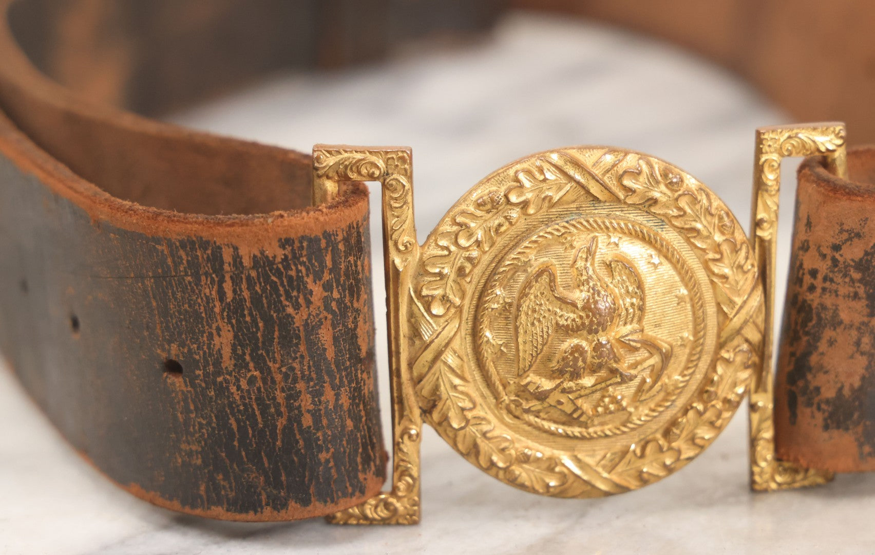 Lot 060 - Trio Of Antique Leather Belts Including Brass Anchor Buckle, Brass Eagle-And-Anchor Buckle, And Belt Marked “Sgt. Standish, Co. L. 182nd Inf.”