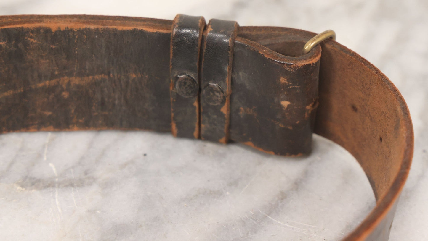 Lot 060 - Trio Of Antique Leather Belts Including Brass Anchor Buckle, Brass Eagle-And-Anchor Buckle, And Belt Marked “Sgt. Standish, Co. L. 182nd Inf.”