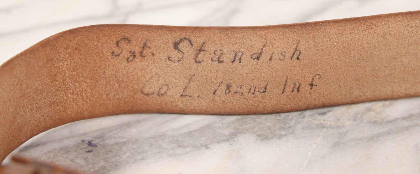 Lot 060 - Trio Of Antique Leather Belts Including Brass Anchor Buckle, Brass Eagle-And-Anchor Buckle, And Belt Marked “Sgt. Standish, Co. L. 182nd Inf.”