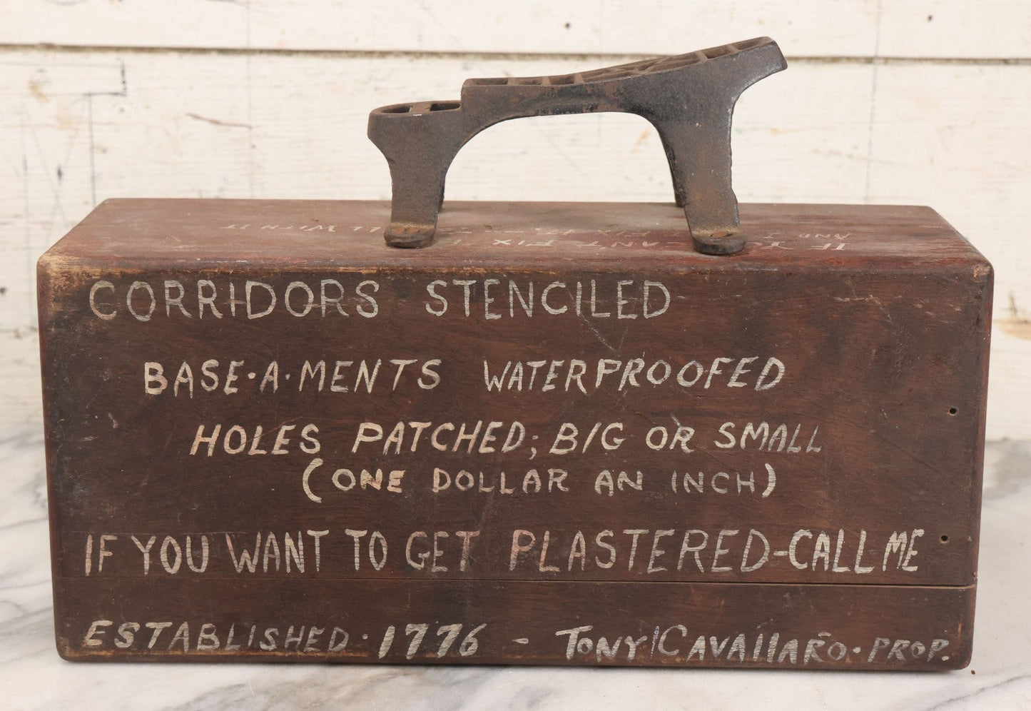 Lot 062 - Vintage Hand Painted Folk Art Shoe Shine Box With Humorous Lettering, Cast Iron Shoe Rest, Signed Tony Cavallaro, Advertising Handyman Services, "If You Want To Get Plastered - Call Me", Missing Internal Drawer