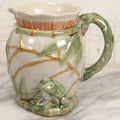 Lot 070 - Vintage Majolica Ceramic Jug With Bamboo And Lilypad Motifs, Craquelure Finish, Figural Frog At Base, 7" H