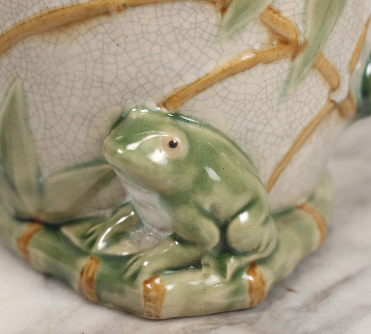 Lot 070 - Vintage Majolica Ceramic Jug With Bamboo And Lilypad Motifs, Craquelure Finish, Figural Frog At Base, 7" H