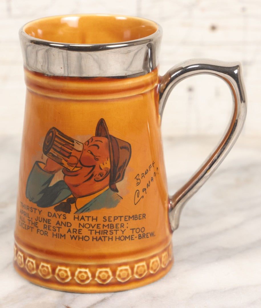 Lot 079 - Vintage Pottery Stein With "Home-Brew" Verse With Beer Chugging Man And "What's Yours?" Illustration On Verso, Metallic Painted Lip And Handle, Stamped Makers Mark Lord Nelson Pottery, England On Bottom, 5-1/4" H