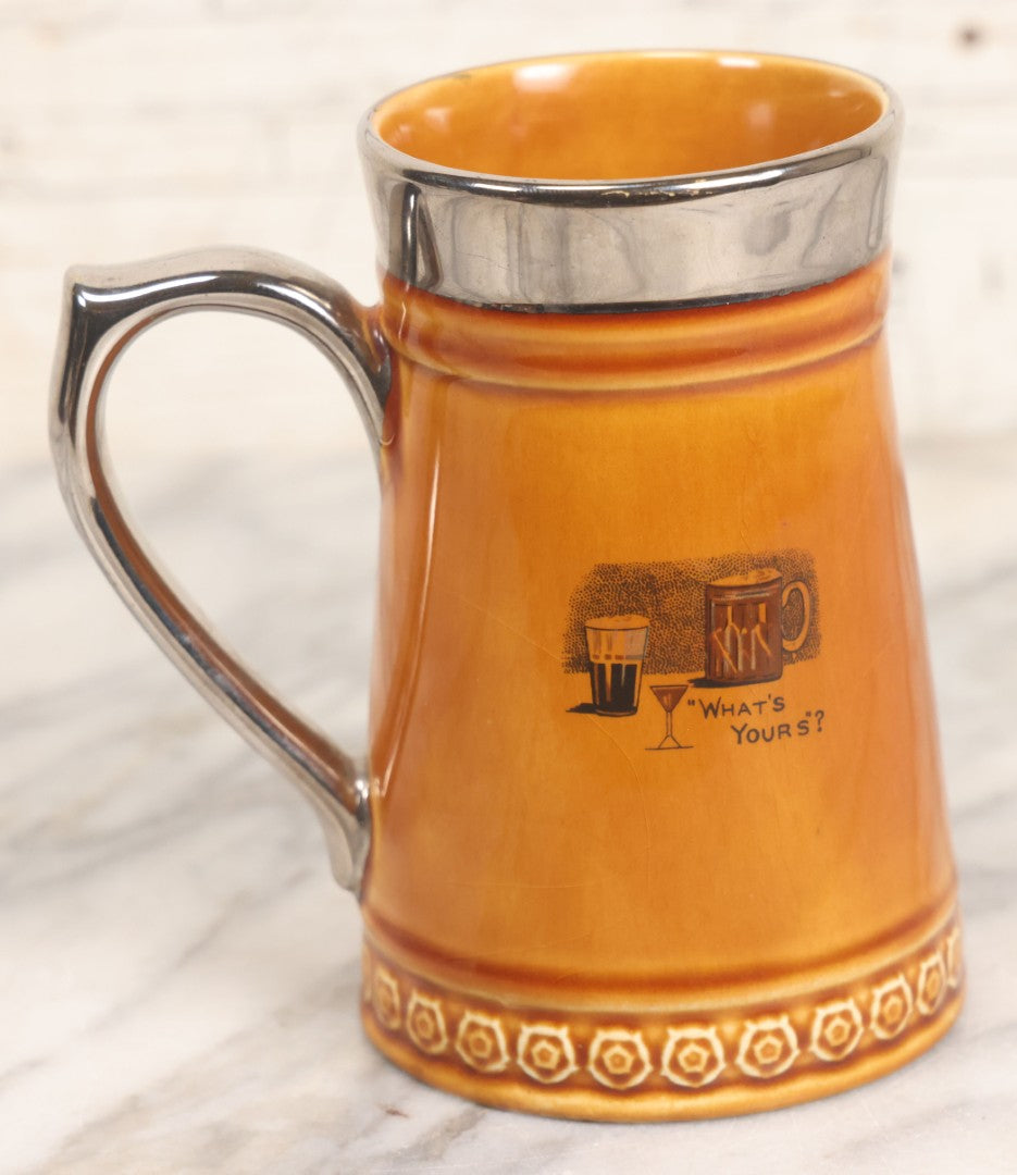 Lot 079 - Vintage Pottery Stein With "Home-Brew" Verse With Beer Chugging Man And "What's Yours?" Illustration On Verso, Metallic Painted Lip And Handle, Stamped Makers Mark Lord Nelson Pottery, England On Bottom, 5-1/4" H