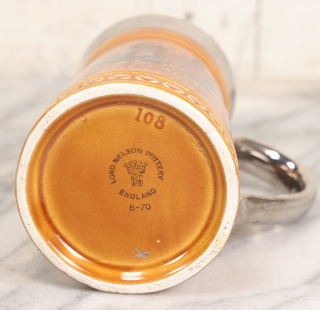 Lot 079 - Vintage Pottery Stein With "Home-Brew" Verse With Beer Chugging Man And "What's Yours?" Illustration On Verso, Metallic Painted Lip And Handle, Stamped Makers Mark Lord Nelson Pottery, England On Bottom, 5-1/4" H