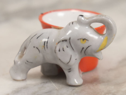 Lot 083 - Vintage Miniature Porcelain Elephant Match Holder With Orange Painted Dish, Marked Japan, 1-1/2" H