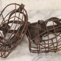 Lot 084 - Pair Of Antique Metal Cage Dog Muzzles With Leather Straps