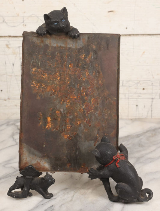 Lot 085 - Antique Cast Iron Cat Frame With Three Cats And Red Bow Detail, Note Damage