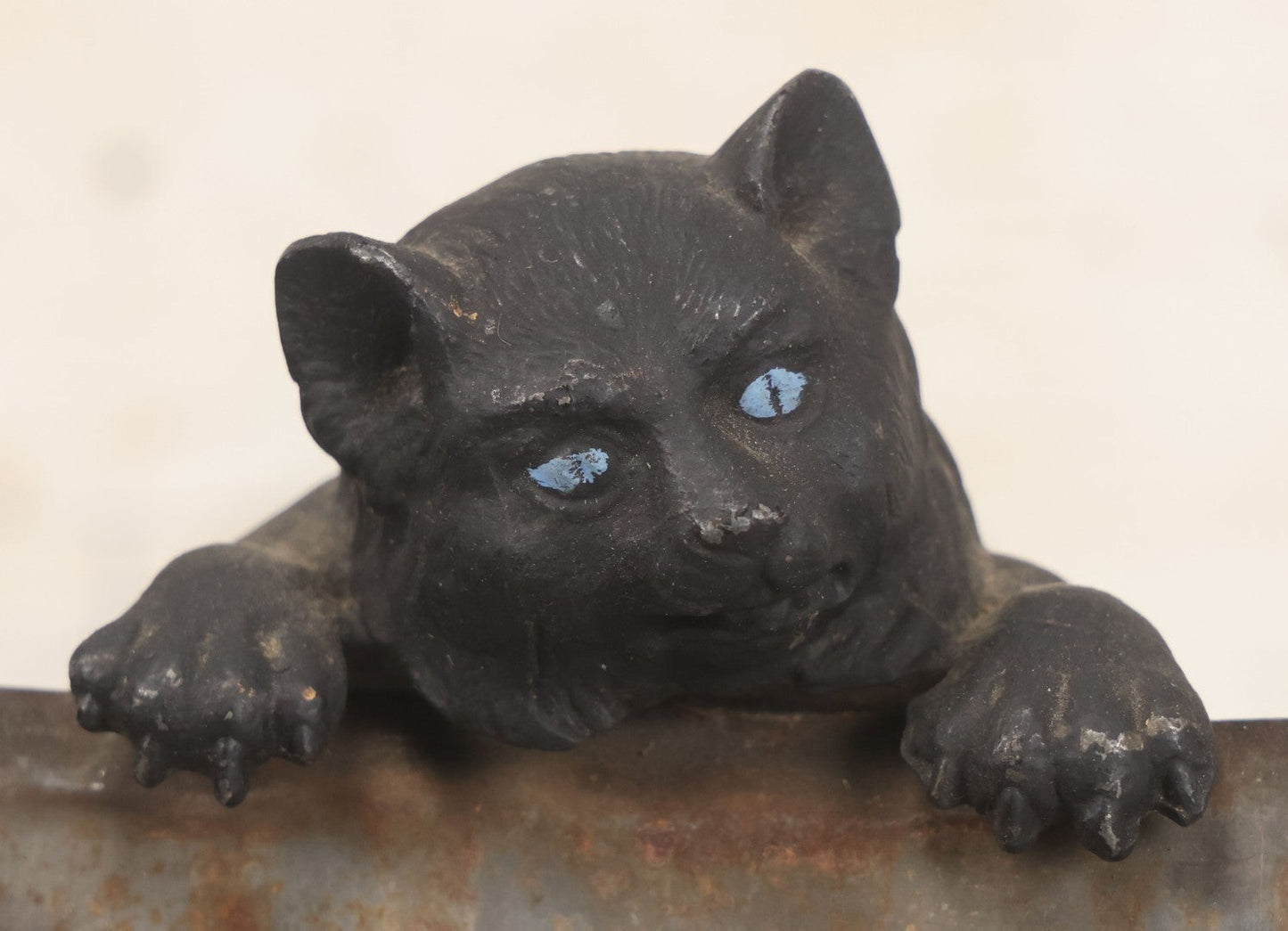 Lot 085 - Antique Cast Iron Cat Frame With Three Cats And Red Bow Detail, Note Damage