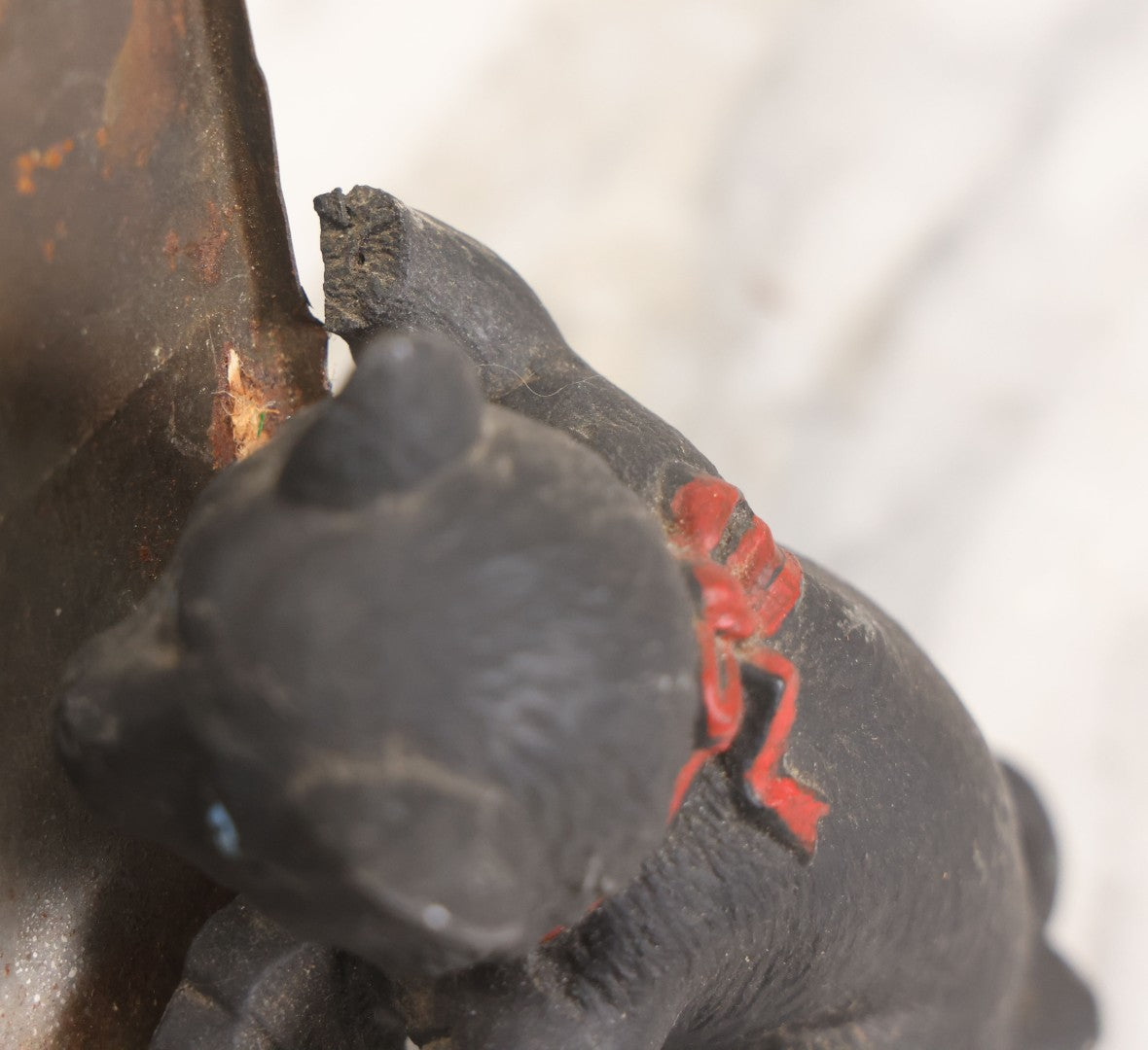 Lot 085 - Antique Cast Iron Cat Frame With Three Cats And Red Bow Detail, Note Damage