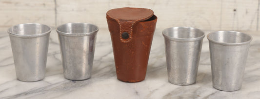 Lot 104 - Vintage Set Of Four Tin Travel Cups With Brown Leather Case