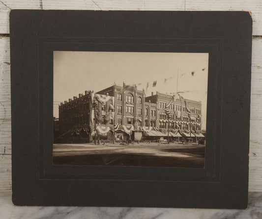 Lot 115 - Antique Boarded Photograph Of The E.F. Lane Building And Gurney's Block, Main Street, Keene, New Hampshire, Decorated With Flags And Patriotic Bunting