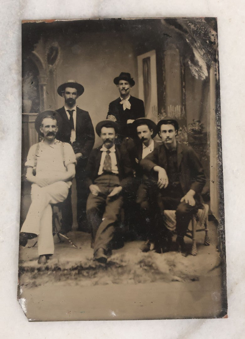 Lot 130 - Antique Tintype Photograph Of Six Men In Hats, Seated And Standing, Two Smoking Cigars In Studio Setting