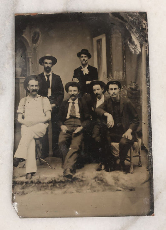 Lot 130 - Antique Tintype Photograph Of Six Men In Hats, Seated And Standing, Two Smoking Cigars In Studio Setting