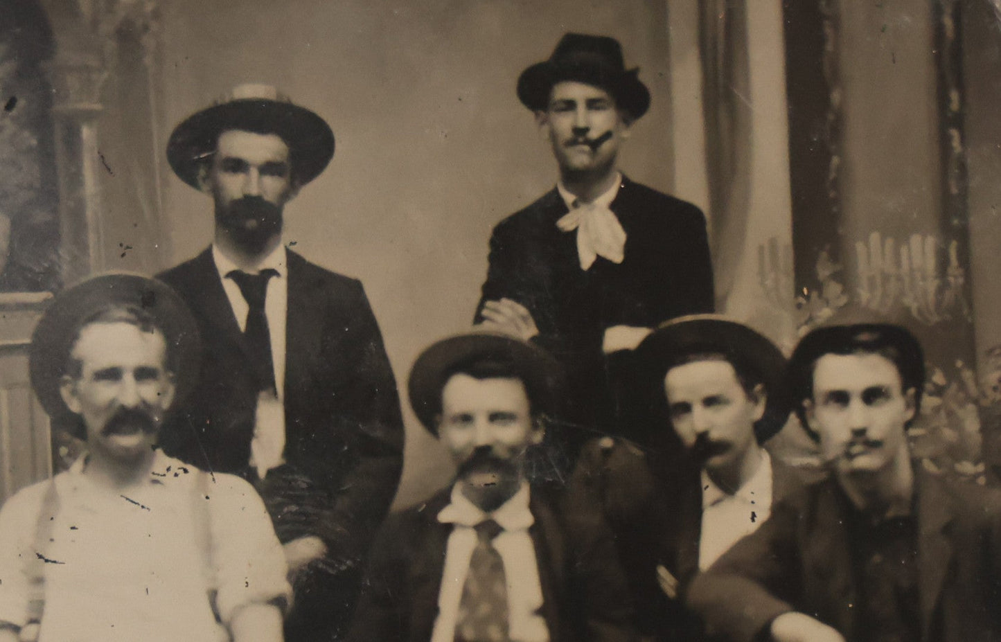 Lot 130 - Antique Tintype Photograph Of Six Men In Hats, Seated And Standing, Two Smoking Cigars In Studio Setting