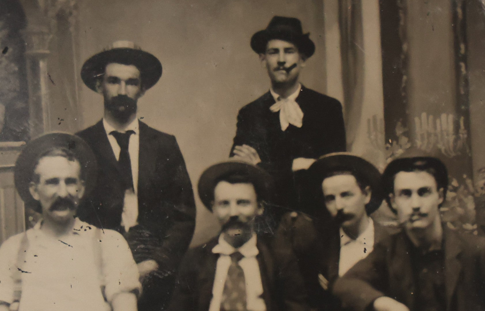 Lot 130 - Antique Tintype Photograph Of Six Men In Hats, Seated And Standing, Two Smoking Cigars In Studio Setting