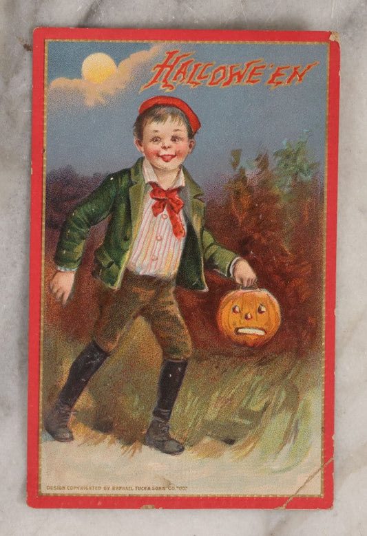 Lot 154 - Antique Embossed Halloween Postcard Of Boy With Jack-O-Lantern Candy Bucket, Copyright Raphael Tuck & Sons Co. Ltd., Halloween Series No. 174, Printed In Saxony, Unused, Circa 1910